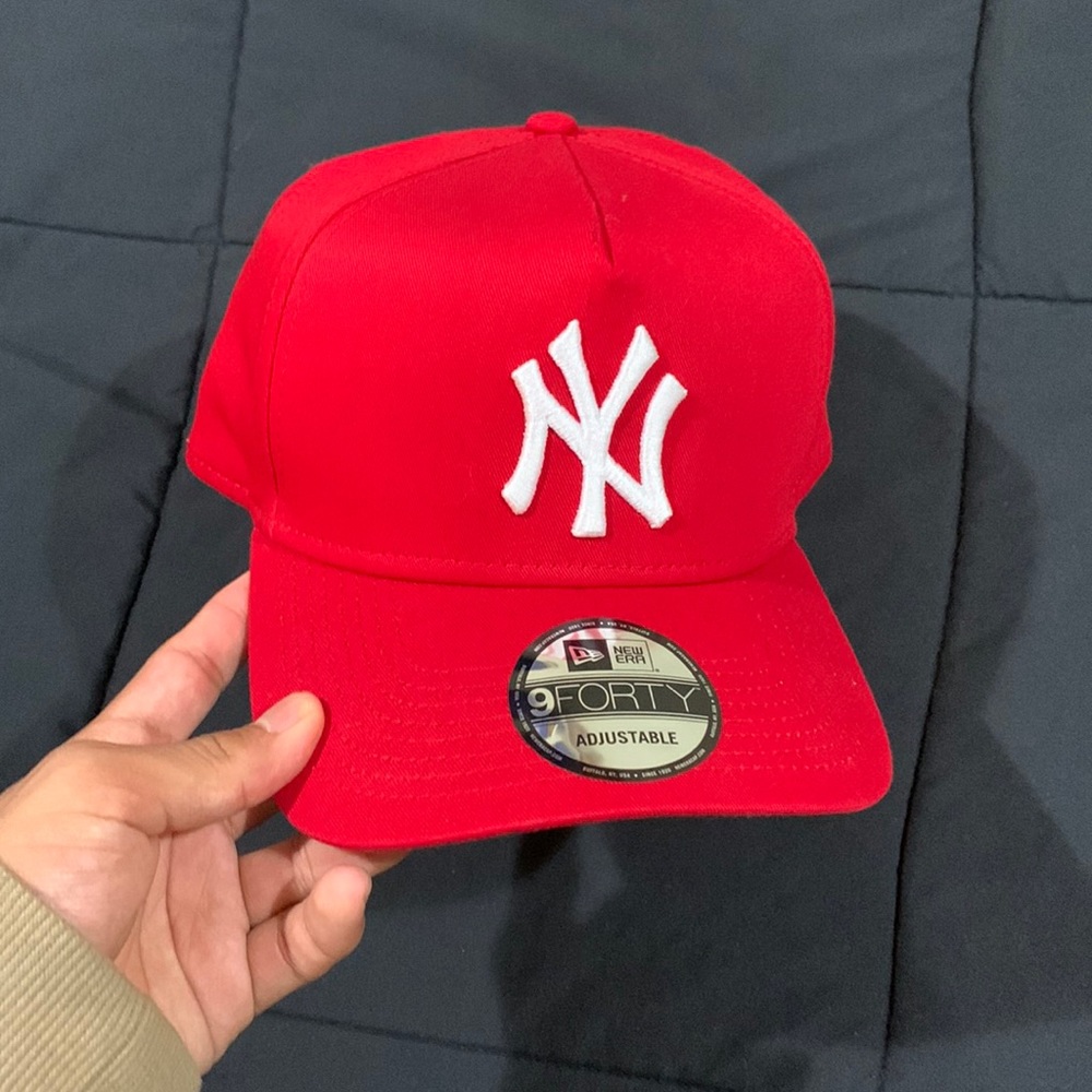 I am selling a red/white hat. It is brand new and is adjustable.